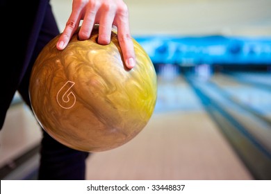 Hand with the bowling ball