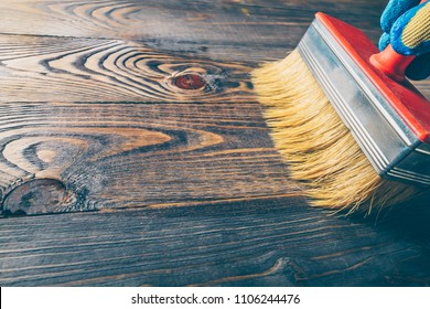 Hand Brush Covers With Oil Old Wooden Floor - Repair And Restoration Of The Floor