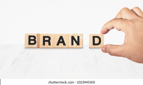 Hand Building Brand On White Background