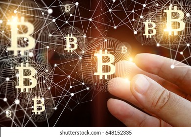 Hand Of A Businessman With Bitcoin In The Network.