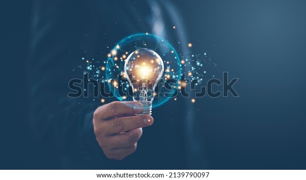 Hand Businessman Holding Illuminated Light Bulb Stock Photo 2139790097 ...