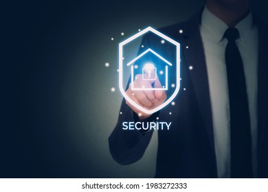 Hand Of Businessman Pushing Sign Virtual Lock While Security System And Safety With Home For Protection And Privacy Of Family, Secure And Access Digital For Residential, Business Futuristic Concept.