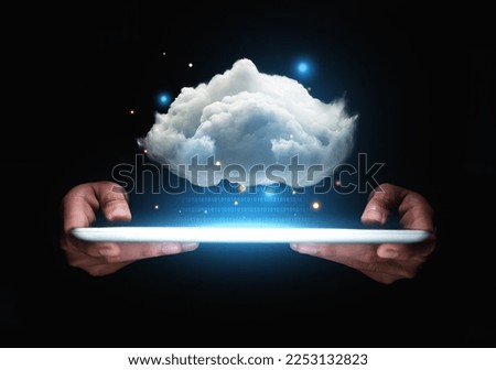 Hand of businessman showing cloud computing on tablet, Computer system resources and data storage, Cloud service technologies concept.