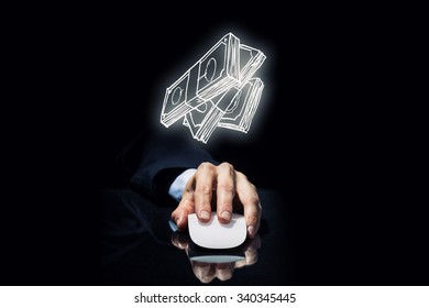 Hand Of Businessman In Suit On Dark Background Using Wireless Computer Mouse