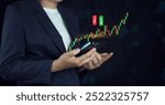 Hand of Businessman or trader is showing a growing virtual hologram stock on smartphone, planning and strategy, Stock market, Business growth, progress or success concept. invest in trading.