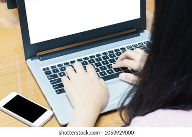 Hand of businessman using laptop for hard working on white screen