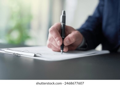 Hand, businessman and writing on document for signature for legal contract, agreement or deal for partnership as Lawyer. Attorney, paperwork and compliance, information or application for negotiation - Powered by Shutterstock