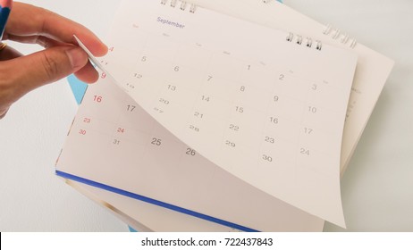 Hand With Calendar  In Planning Concept.