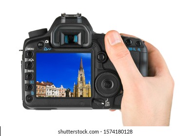Hand with camera and Novi Sad - Serbia image (my photo) isolated on white background