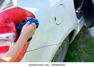 Hand With Car Wash. Self-service Car Wash. Home Car Wash. Rag In Hand