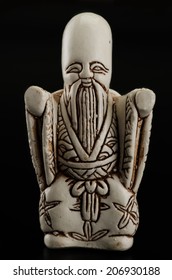 Hand Carved Fukurokuju Netsuke On Black