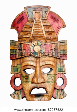 Hand carved wooden Mayan mask isolated on a white background