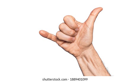 Hand Of Caucasian Middle Age Man Over Isolated White Background Gesturing Hawaiian Shaka Greeting Gesture, Telephone And Communication Symbol