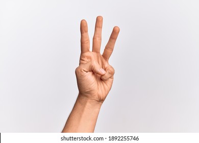 Hand of caucasian young man showing fingers over isolated white background counting number 3 showing three fingers - Shutterstock ID 1892255746