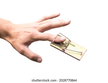 The Hand Was Caught In A Mousetrap. Close Up. Isolated On A White Background.