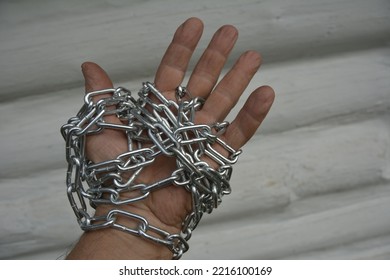 The Hand Is Chained. The Concept Of The Struggle For Human Rights. Human Trafficking.