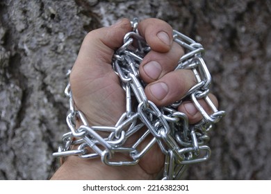 The Hand Is Chained. The Concept Of The Struggle For Human Rights. Human Trafficking.