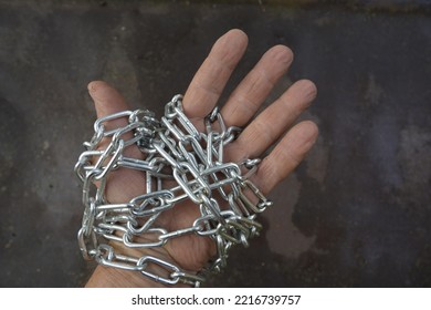 The Hand Is Chained. The Concept Of The Struggle For Human Rights. Human Trafficking.