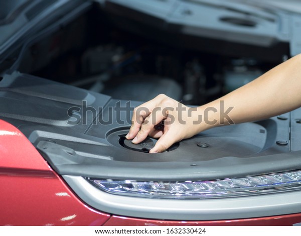 Hand check\
engine of new car transportation\
concept