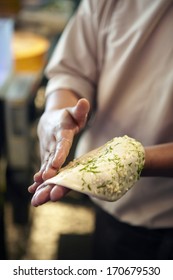 Hand Of Chef Making Naan