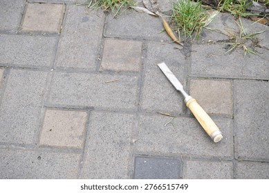 Hand chisel carpentry and cutting tool. Stemmeisen on ground copy spase