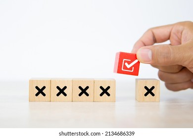 Hand Choose Check Mark On Cube Wooden Toy Block Stack With Cross Symbol For True Or False Changing Mindset Or Way Of Adapting To Change Leader And Transform Quiz Answer And Poll Concept