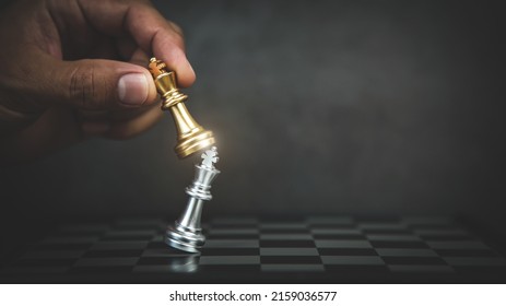 Hand Choose King Chess Fight On Chessboard Concept Of Team Player Or Business Team And Leadership Strategy And Human Resources Organization Management Or Goal To Win Or Strong Winner.