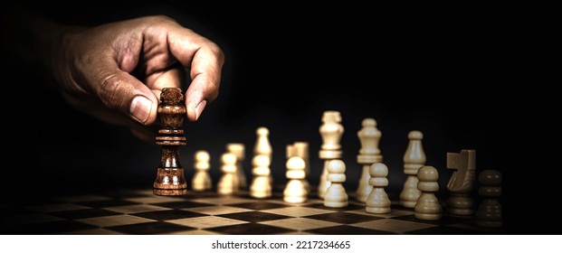 Hand Choose King First On Chess Pieces Concepts Of Leadership Or Wining To Challenge Or Battle Fighting Of Business Team Player And Strategy And Risk Management Or Human Resource.