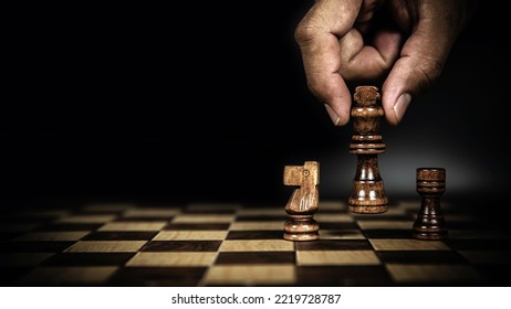 Hand Choose King First On Chess Pieces Concepts Of Leadership Or Wining To Challenge Or Battle Fighting Of Business Team Player And Strategy And Risk Management Or Human Resource.