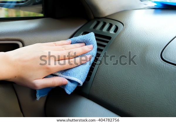 hand clean air\
conditioning in a car 