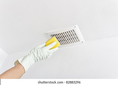 Hand Cleaning Ceiling.