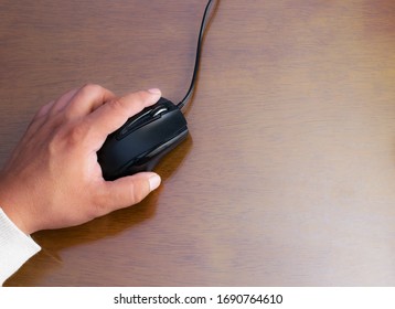 Hand Clicking On Computer Mouse