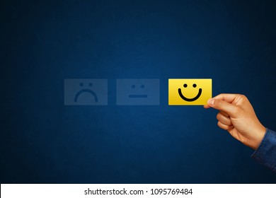 Hand Of Client Show A Feedback With Smile Face Card. Service Rating, Satisfaction Concept