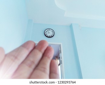 Hand and clock