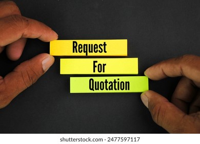hand and colored paper with the word Request for quote or RFQ