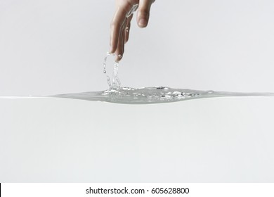 Hand Coming Out Of Water