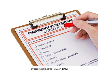 Hand Completing Emergency Preparation List