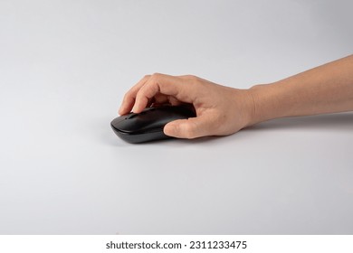 Hand and computer mouse wireless on white background. - Shutterstock ID 2311233475