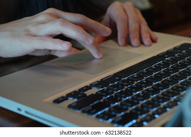 Hand with computer notebook