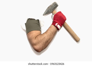 Hand in construction glove with hammer punched background. Renovation and construction process. Hand on a white background. Isolate