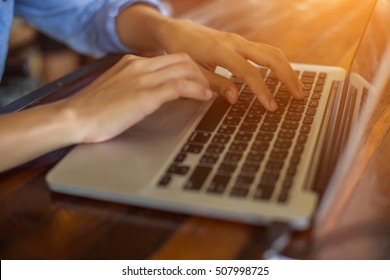 hand control on a laptop touchpad - Shutterstock ID 507998725
