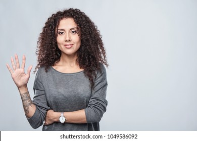 Hand Counting - Five Fingers. Smiling Woman Showing Five Fingers