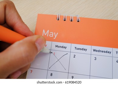 Hand Cross On Calendar. 1st Of May Is Labour Day And An International Public Holiday.