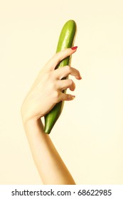 Hand With Cucumber. Ripe Cucumber In The Sexy Woman's Hand.