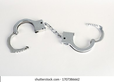 Hand Cuffs On A White Background