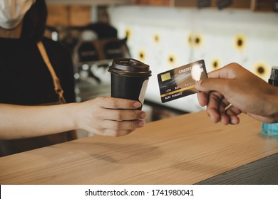 Hand Customer Paying With Credit Card For Buying Hot Coffee Cup On Counter In Modern Cafe Coffee Shop, Cafe Restaurant, Digital Payment, Small Business Owner, Takeaway Food, Food And Drink Concept