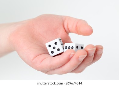 Hand with dice.