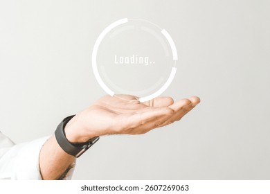 A hand with a digital loading graphic hovering above. Loading graphic signifies progress. Hand and loading graphic create a tech vibe. Innovative technology, high-tech futuristic technology concept.