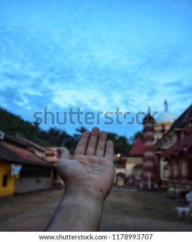 a hand dirction twowards sky 