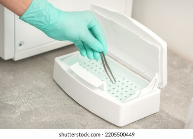 Hand Disinfects Tweezers With Cleaning Systems For Medical Instruments. Ultrasonic Cleaner